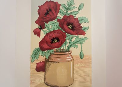 linoprint of a stoneware vase with poppies.