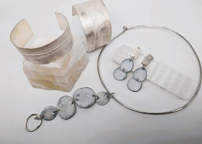 Amanda-graham-neckpiece-and-earrings-with-enamel._-reticuated-cuff-bangles