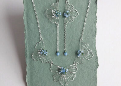 Petal statement necklace and drop earrings Judith Brown