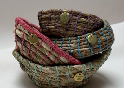 Much Nita weaving coiled basketry